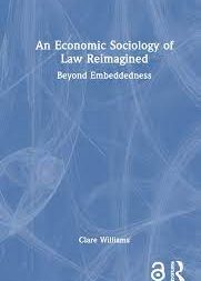 Image contains a blue book cover with the title; An economic sociology of law reimagined.