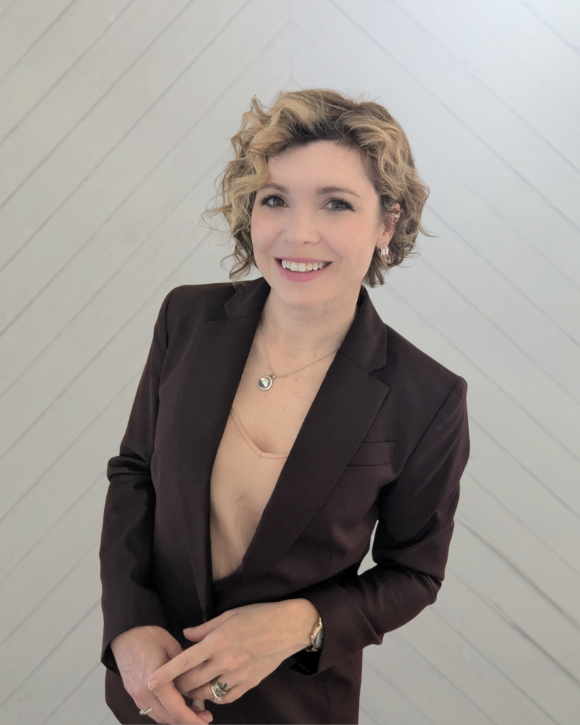 Headshot of a professional woman in black suit