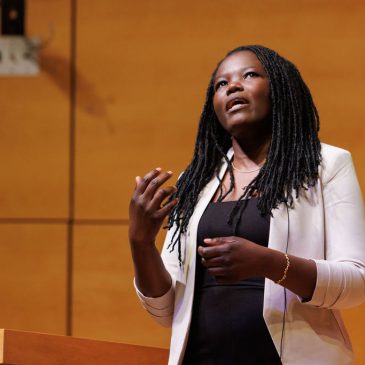 Dr. Jane Anyango on stage speaking