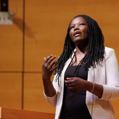 Dr. Jane Anyango on stage speaking