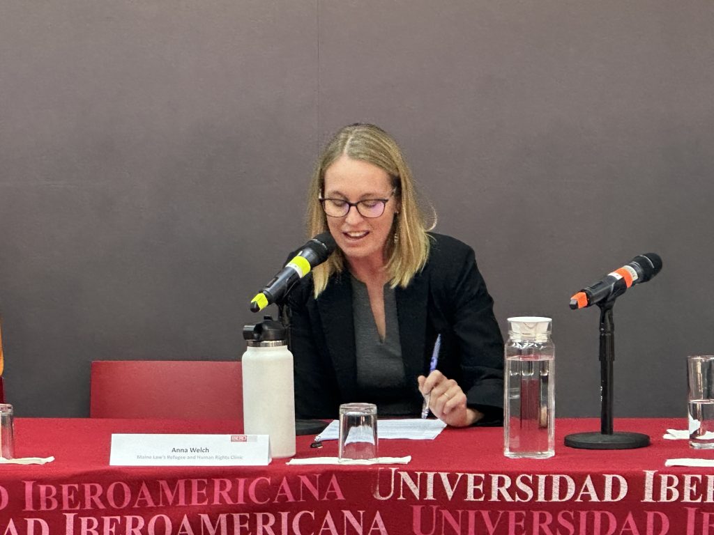 Anna Welch, RHRC director, delivers a talk at  IBEROAMERICANA University during a conference sponsored by the UNHCR. 